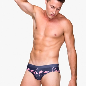 Men's dark blue swimming briefs with pink flamingo print and elastic waistband