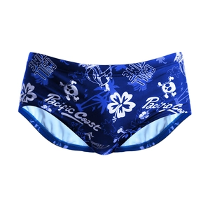 Men's navy blue swim trunks with Pacific Coast skull and tropical palm print