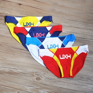 Detail view showing four color options of UXH low-rise men's patchwork swim briefs