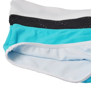 Detail of blue men's swim trunks featuring mesh panels and soft inner lining