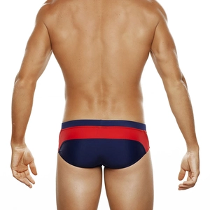 Rear view of men's color-block swim briefs in bold red and navy blue with professional fit
