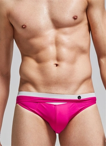 Men's pink swim briefs detail showing white elastic waistband and decorative button