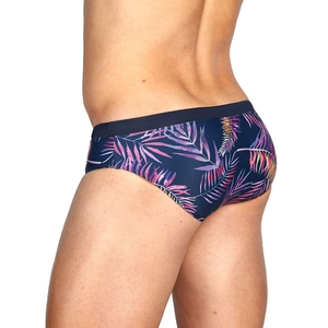 Men's tropical leaf print swim briefs with wide elastic waistband and snug fit