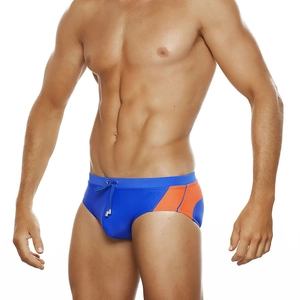 Detail of blue and orange patchwork swimming briefs with adjustable drawstring on model