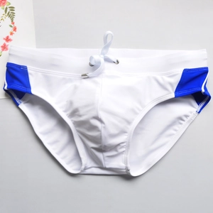 Detail view of men's white swim briefs with blue side panels and adjustable drawstring