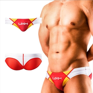 Slip da nuoto a vita bassa da uomo rossi con motivo patchwork bianco e giallo UXH