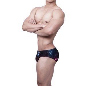 Men's swim briefs with pixelated digital cube print and 3D pouch design in a tight fit