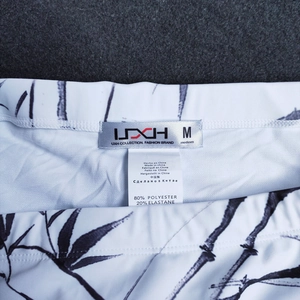 Close-up of swim briefs label showing 80% polyester and 20% elastane fabric composition