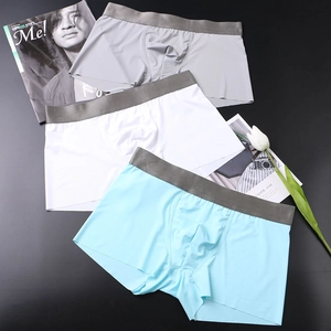 Detailed view of three-pack ice silk men's seamless boxer briefs in gray white and blue