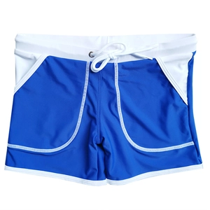Detail of men's quick-dry swimming trunks featuring side pockets and contrast stitching