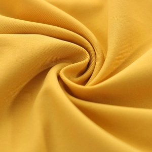 Macro detail of breathable yellow ice silk fabric with seamless micro-ribbed texture