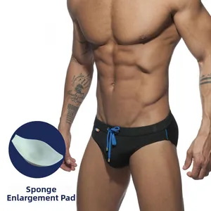 Men's black swim briefs with rainbow tab, blue drawstring and removable foam pouch pad
