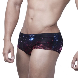 Men's tight swim trunks with colorful pixelated digital print on a black base