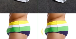 Detailed side view of men's color-block swim briefs with ergonomic U-convex support structure