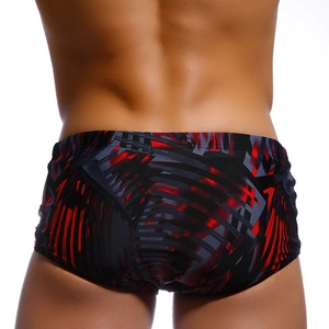 Men's athletic swim trunks with abstract red and black phantom geometric print and slim fit