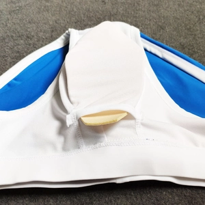 Close-up of men's swim trunks with breathable mesh fabric and removable contour cup pad