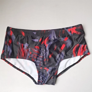 Men's quick-dry swim trunks with black fabric and red abstract geometric patterns