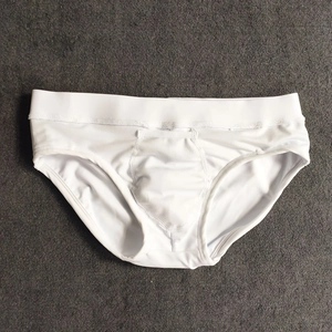 Detailed top view of white men's bikini briefs with elastic waistband and U-convex design