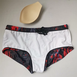 Detail view of men's swim trunks with removable sponge padding and adjustable drawstring