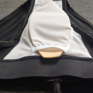 Men's black swim briefs with breathable mesh lining and removable protective cup padding