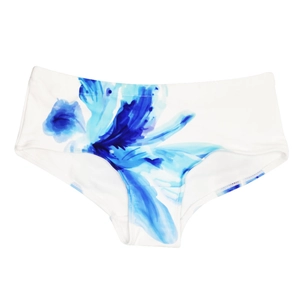 Detail of white men's swim trunks featuring blue watercolor lily print and fine stitching