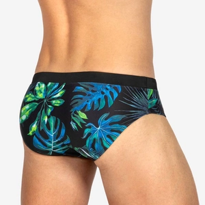Men's swim briefs with tropical leaf prints and black elastic waistband back view