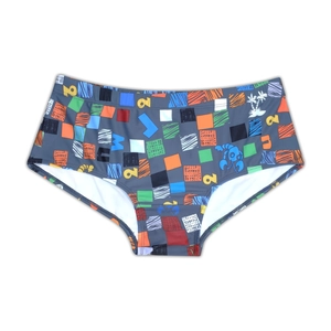 Detail of grey men's swim trunks featuring colorful graffiti blocks and lobster prints