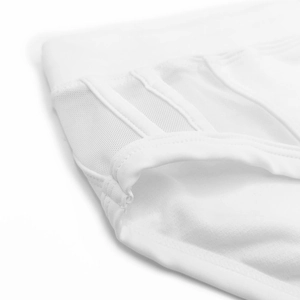 Close-up of white swim trunks featuring breathable mesh panels and reinforced stitching