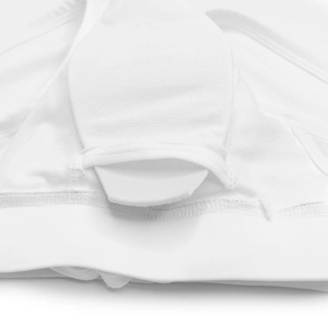 Detail of white swimwear featuring inner lining with a removable cup padding insert