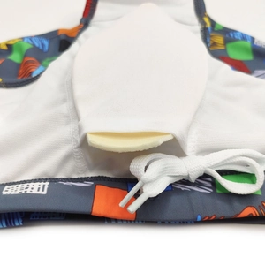 Detail of men's swim trunks featuring breathable mesh lining and removable padding