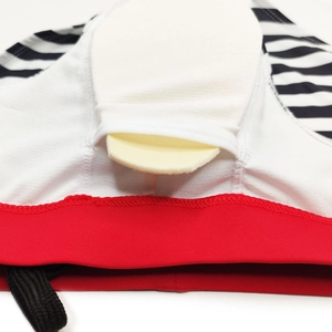 Detail of men striped swim briefs featuring internal pocket with removable sponge pad