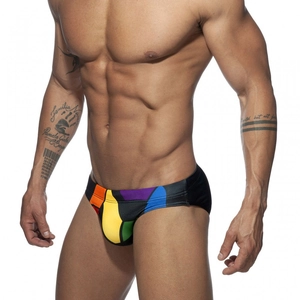 Men's low-rise rainbow striped swim briefs with multi-color patchwork for beachwear