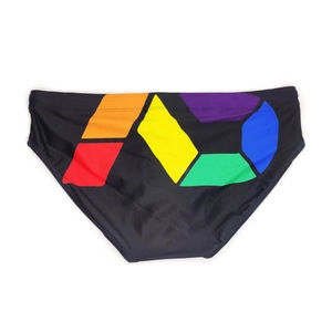 Detail of men's black swim briefs featuring a vibrant rainbow AD logo on high-stretch fabric