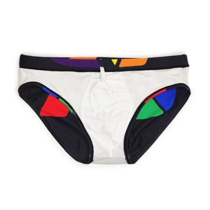 Close-up of white men's swim briefs featuring colorful geometric patterns and drawstring waist