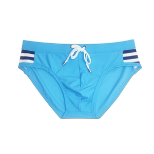Detail of blue men's swim briefs featuring side stripes and drawstring with metal tips