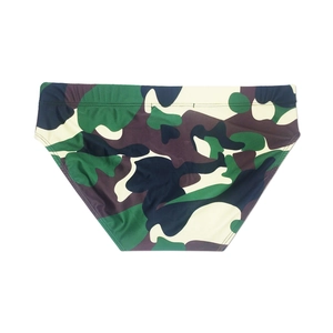 Detail of men's camouflage swim briefs with elastic waistband and jungle pattern print