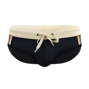 Close-up of navy men's swim briefs with contrast waistband and side stripe detail