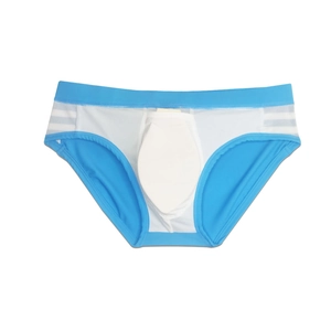 Detail of blue swim briefs featuring mesh panel and white front contour padding