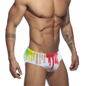 Men's low rise swim briefs in white featuring colorful vibrant paint drip print pattern