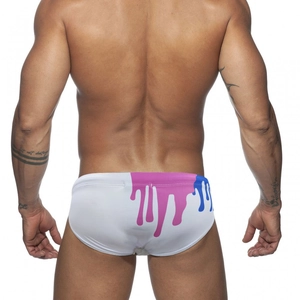 Rear view of men's white swim briefs with artistic pink and blue paint drip pattern