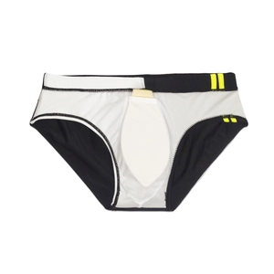 Detailed view of color-block swim briefs with protective inner pad and neon accents