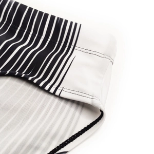 Detailed close-up of quick-dry men's swim briefs showing precise double-needle stitching