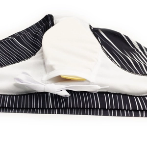 Men's striped swim briefs detail featuring white mesh lining and removable yellow sponge pad