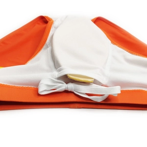 Detail of men's swim briefs showing orange quick-dry fabric and breathable pouch lining