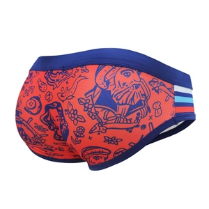Men's orange cartoon print swim briefs with anchor patterns and navy striped waistband