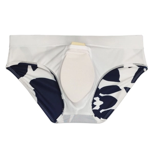 Detail of men's printed swim briefs featuring a protective inner cup and floral pattern