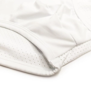 Detailed close-up of white breathable mesh and high-elastic fabric textures on swim briefs