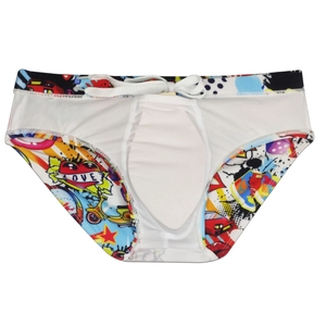 Detail of graffiti print swim briefs featuring white drawstring and soft mesh lining