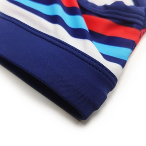 Close-up of high-elasticity striped fabric with durable double-needle stitching detail