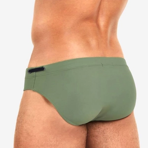 Detail view of olive green men's swim briefs with side drawstring and matte finish fabric